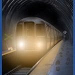 Tunnelbanetåg i tunnel och vid station