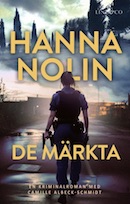 Omslag till De märkta