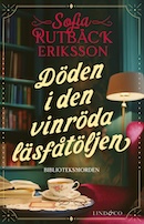 Omslag till Döden i den vinröda läsfåtöljen